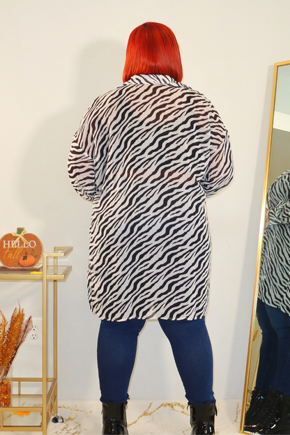 Zebra print long sleeve sheer top